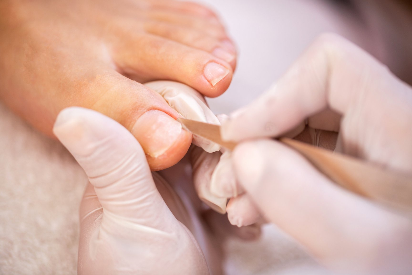 Toenail treatment, pedicure concept, clean toenails